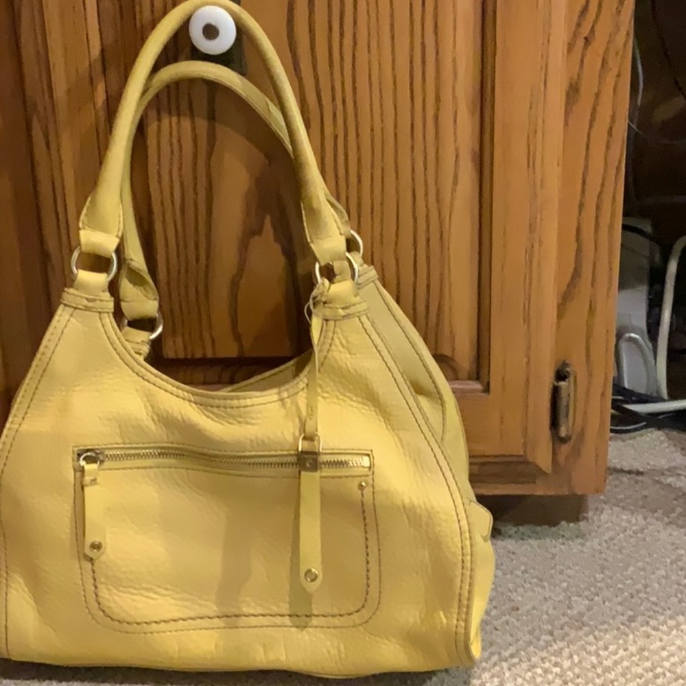 Yellow Cole Haan shoulder bag.